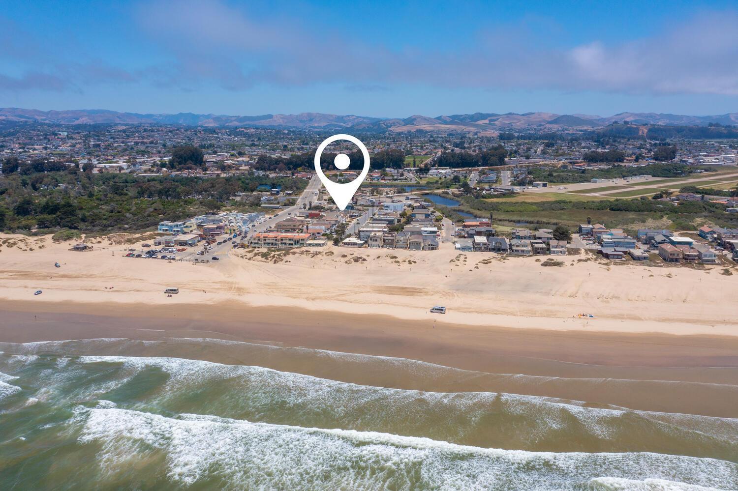 2 min walk to beach! Large Home! Rooftop Deck! view 3