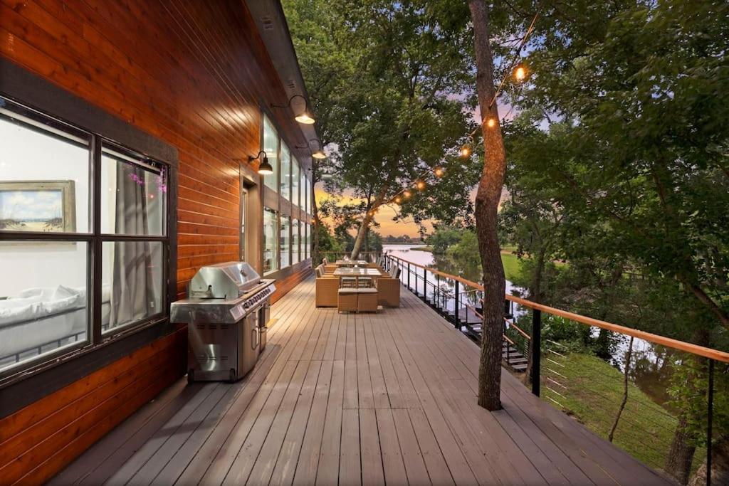 LUX Treehouse on Private Lake next to Lake Conroe with Game room, Paddleboards, Lake Views, and more! view 2