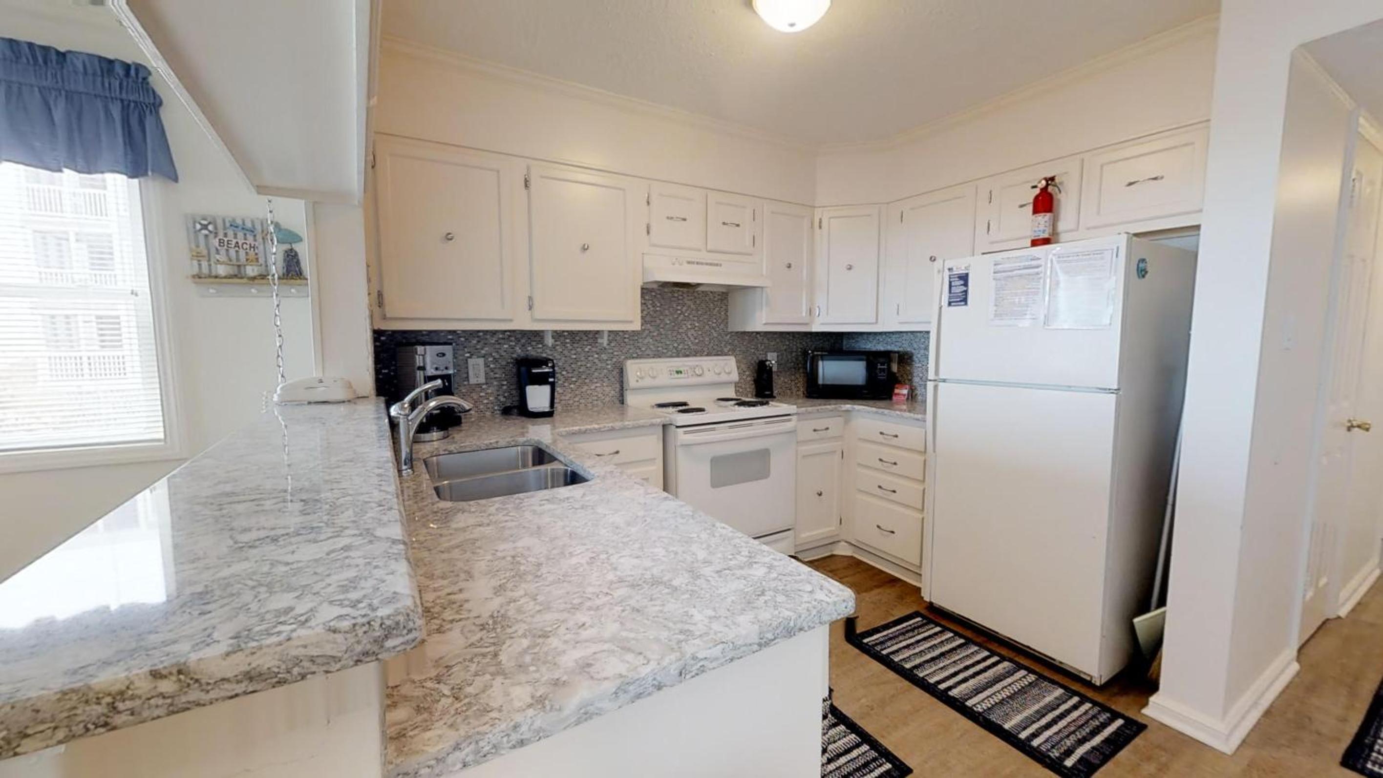 Oceanfront Corner 3BR • 1st Floor • Easy BeachPool Access • Palmwood Villas 110 view 2