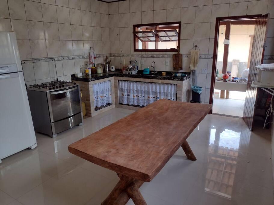 Casa confortável com piscina e churrasqueira
