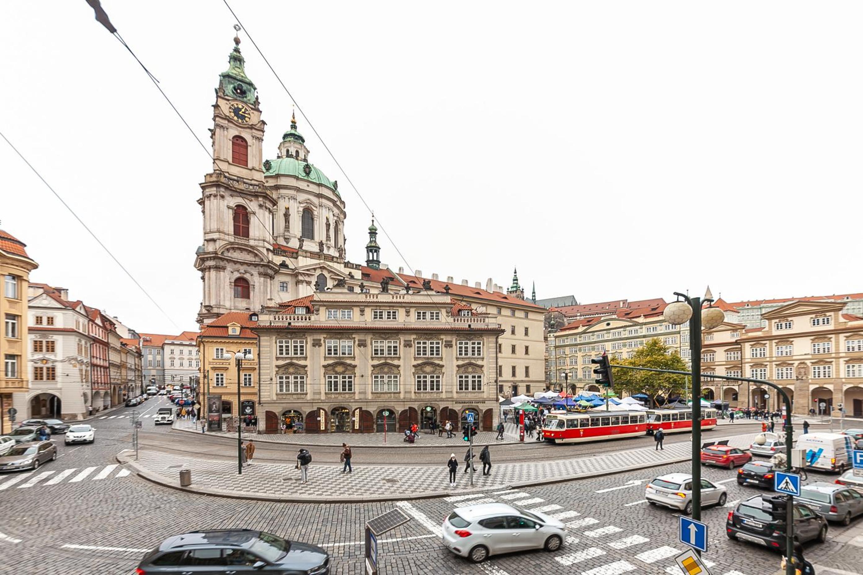 Royal Apartment by Charles Bridge view of Saint Nicholas Church