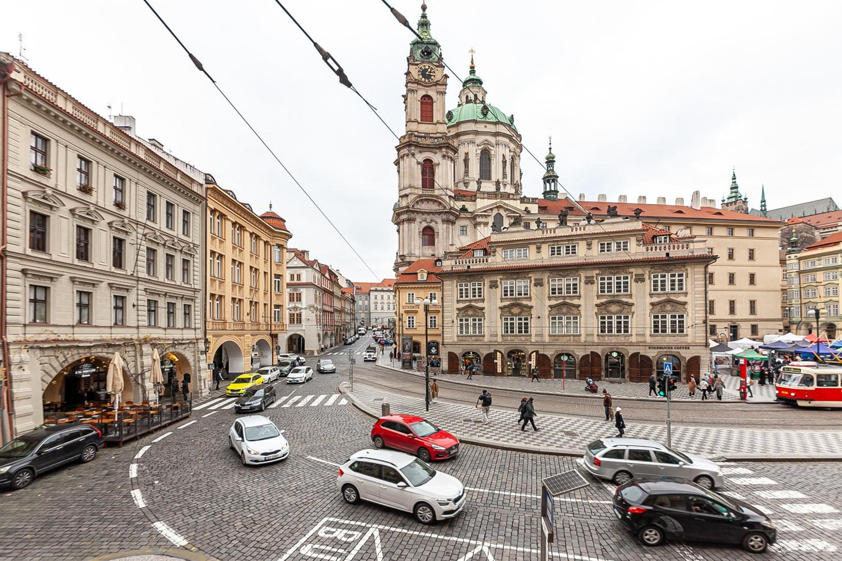 Royal Apartment by Charles Bridge view of Saint Nicholas Church