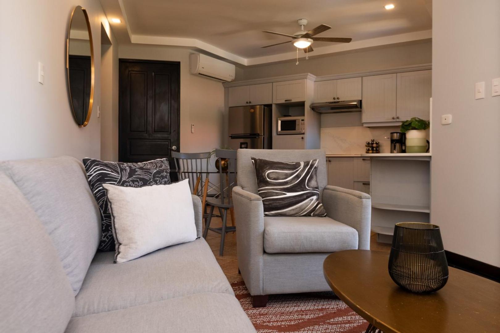 Family Condo Escape 2BR Gated Pool Jacuzzis Security Terrace 2km Walk Beach and Town