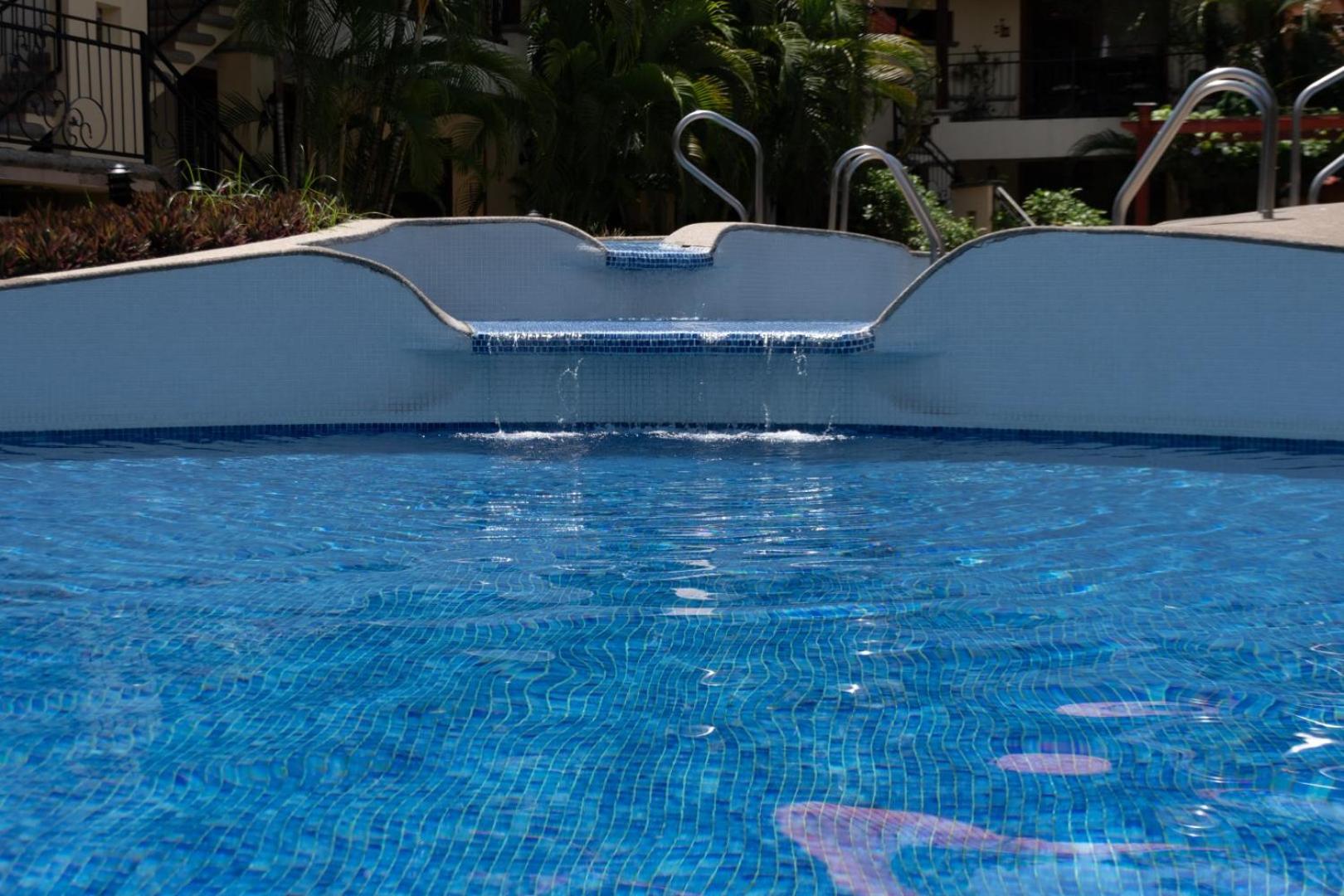 Family Condo Escape 2BR Gated Pool Jacuzzis Security Terrace 2km Walk Beach and Town