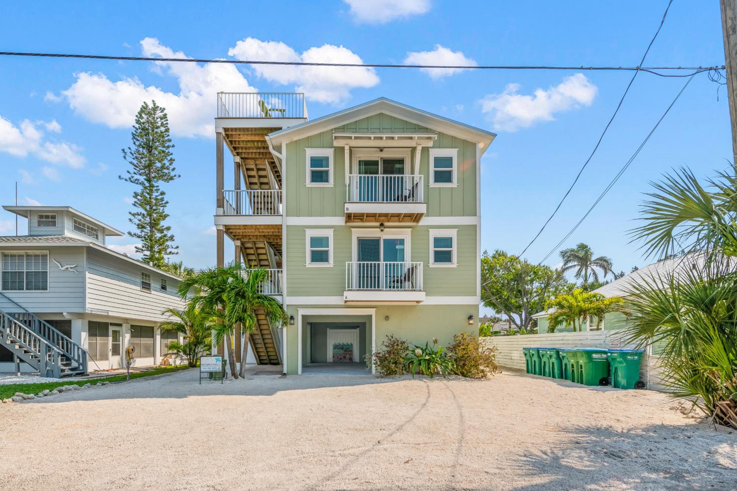Family Tides - 2 Homes in 1 Steps to Beach w Rooftop Views Heated Pool Close to Bridge St view 3
