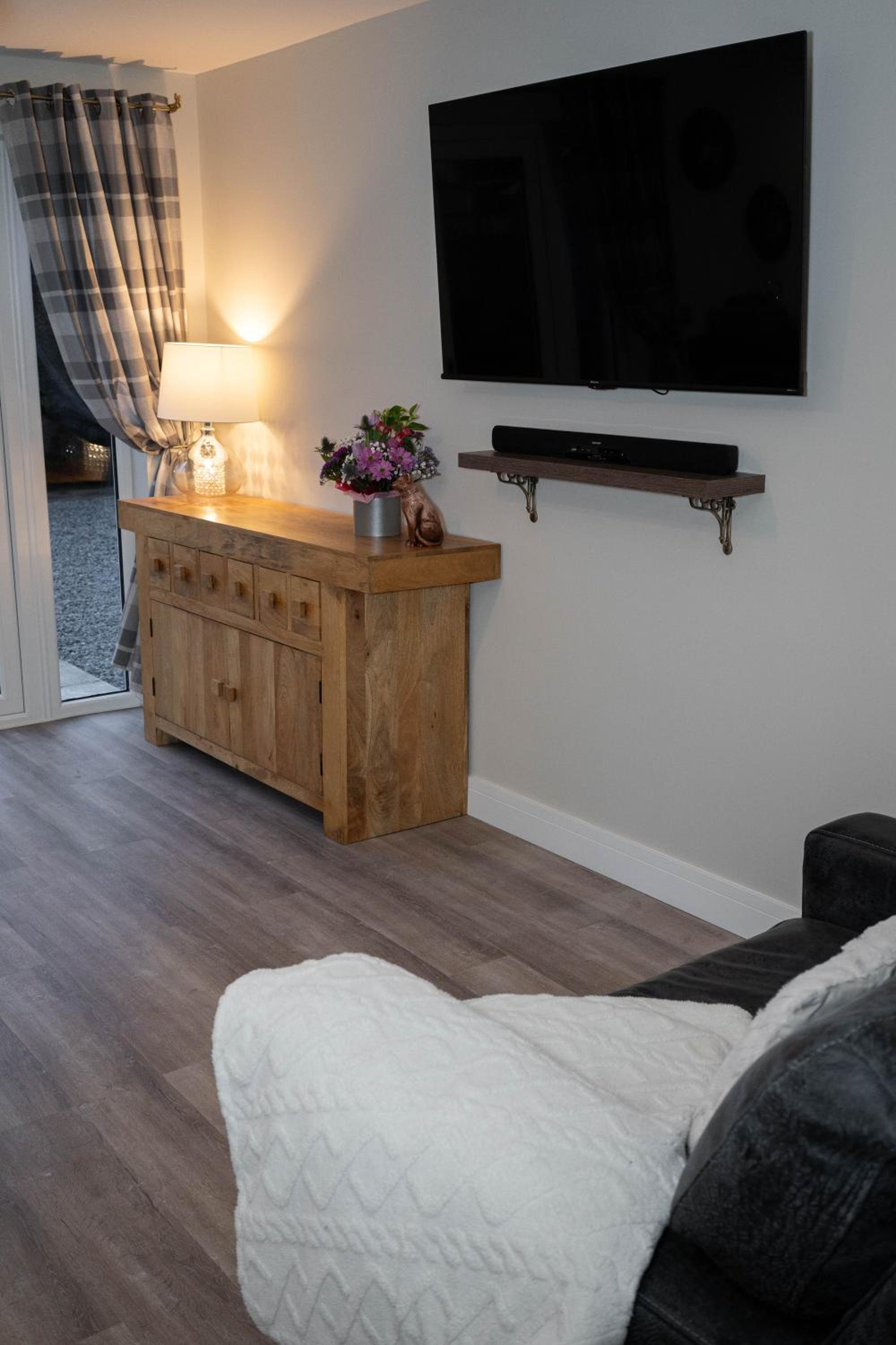Contemporary new build with parking & garden in central location