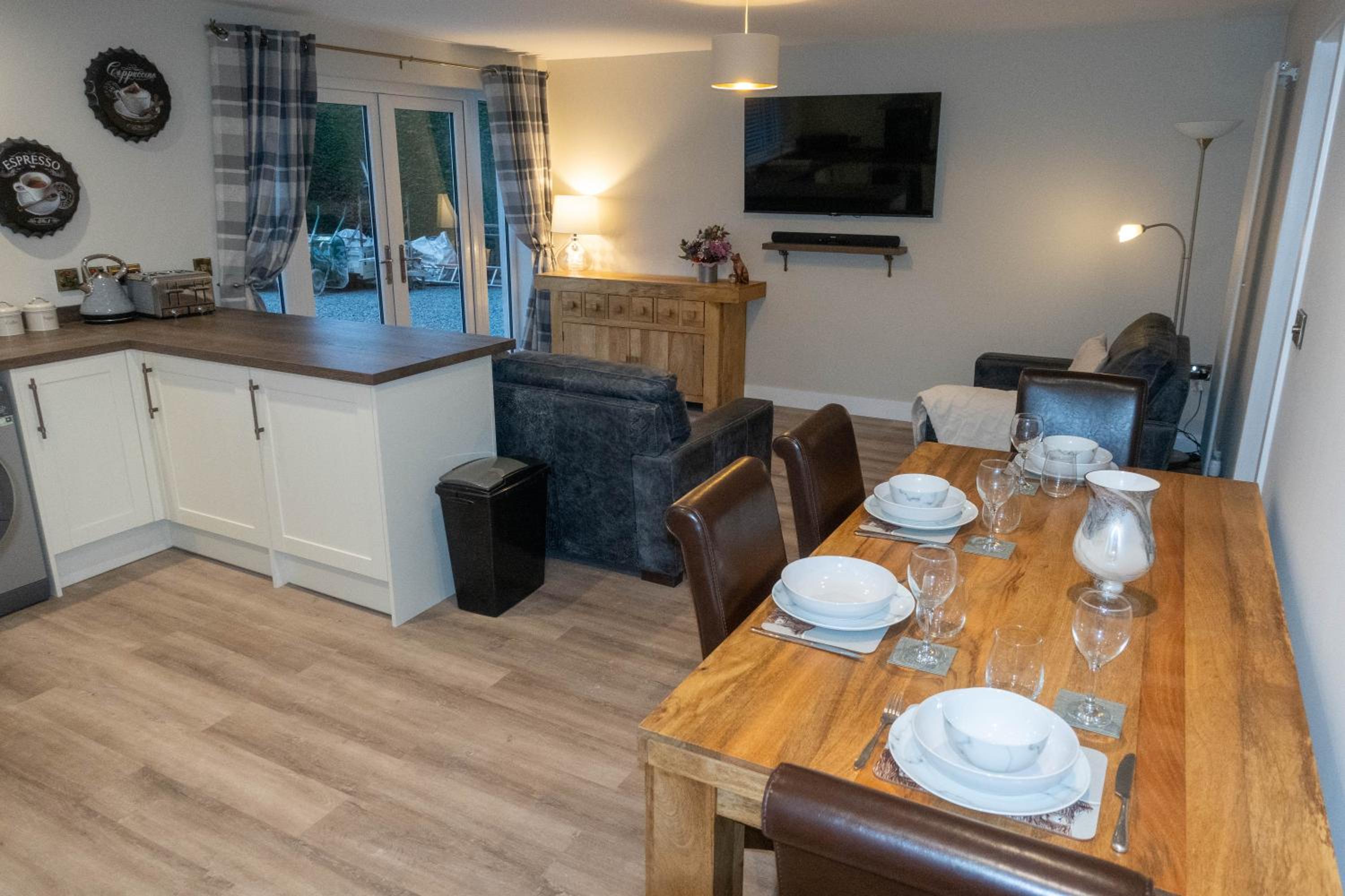 Contemporary new build with parking & garden in central location