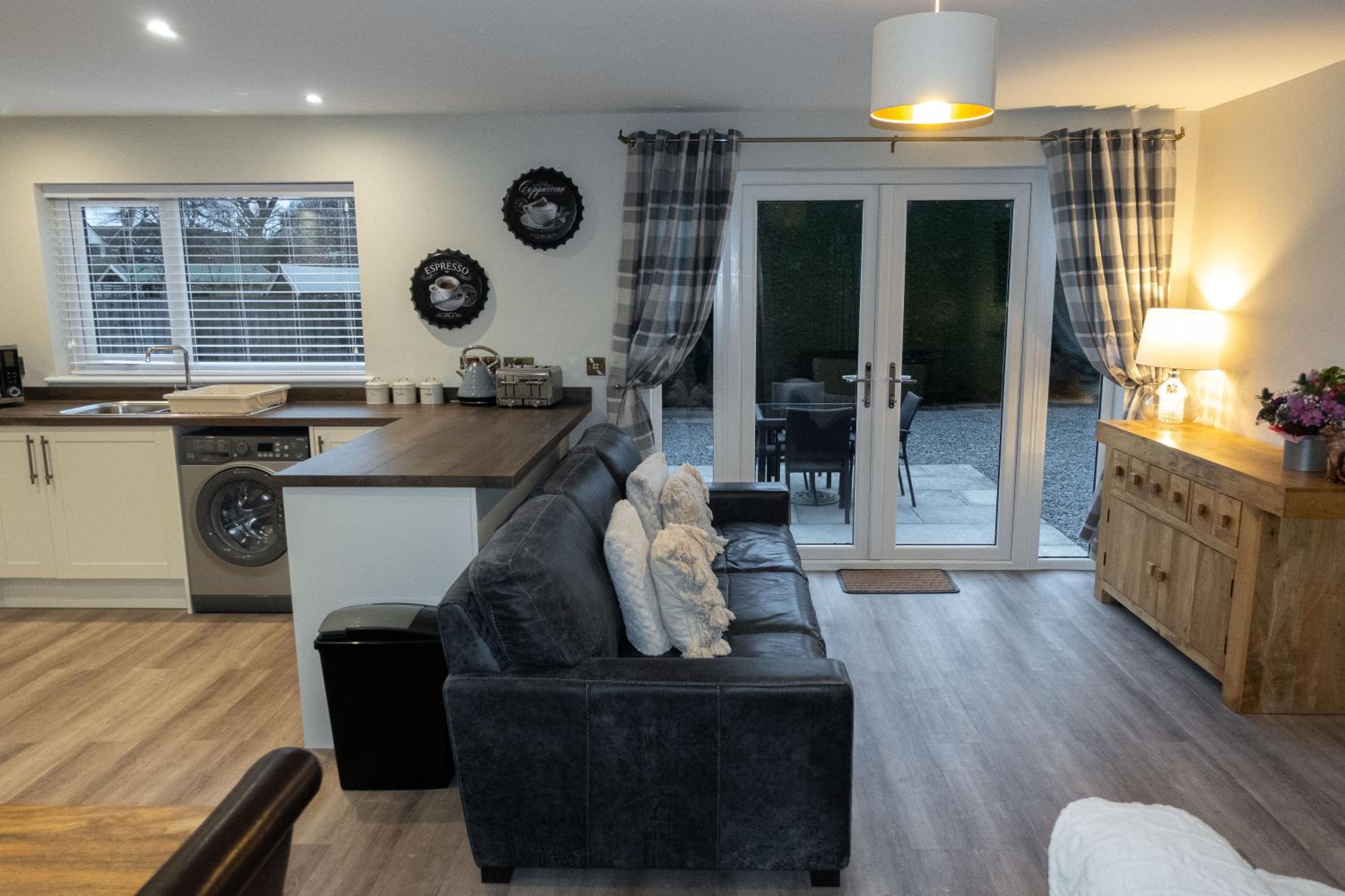 Contemporary new build with parking & garden in central location