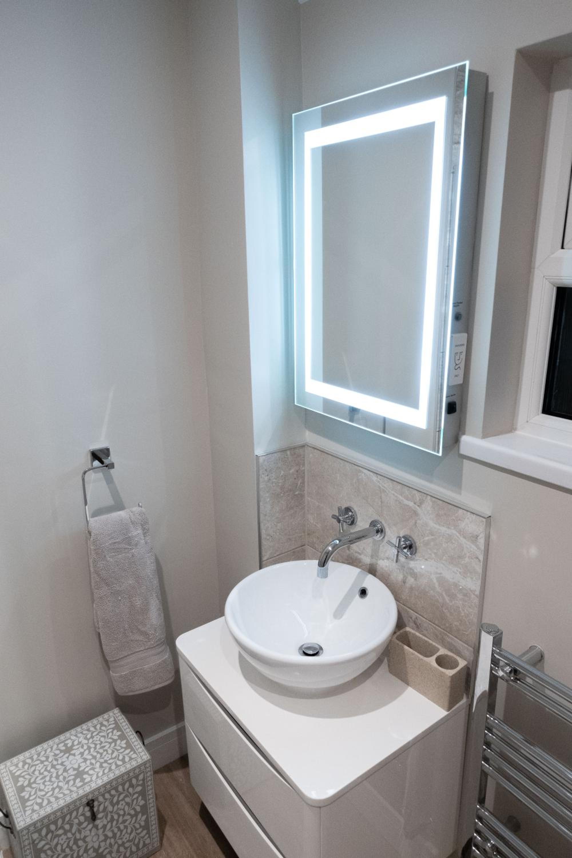 Contemporary new build with parking & garden in central location