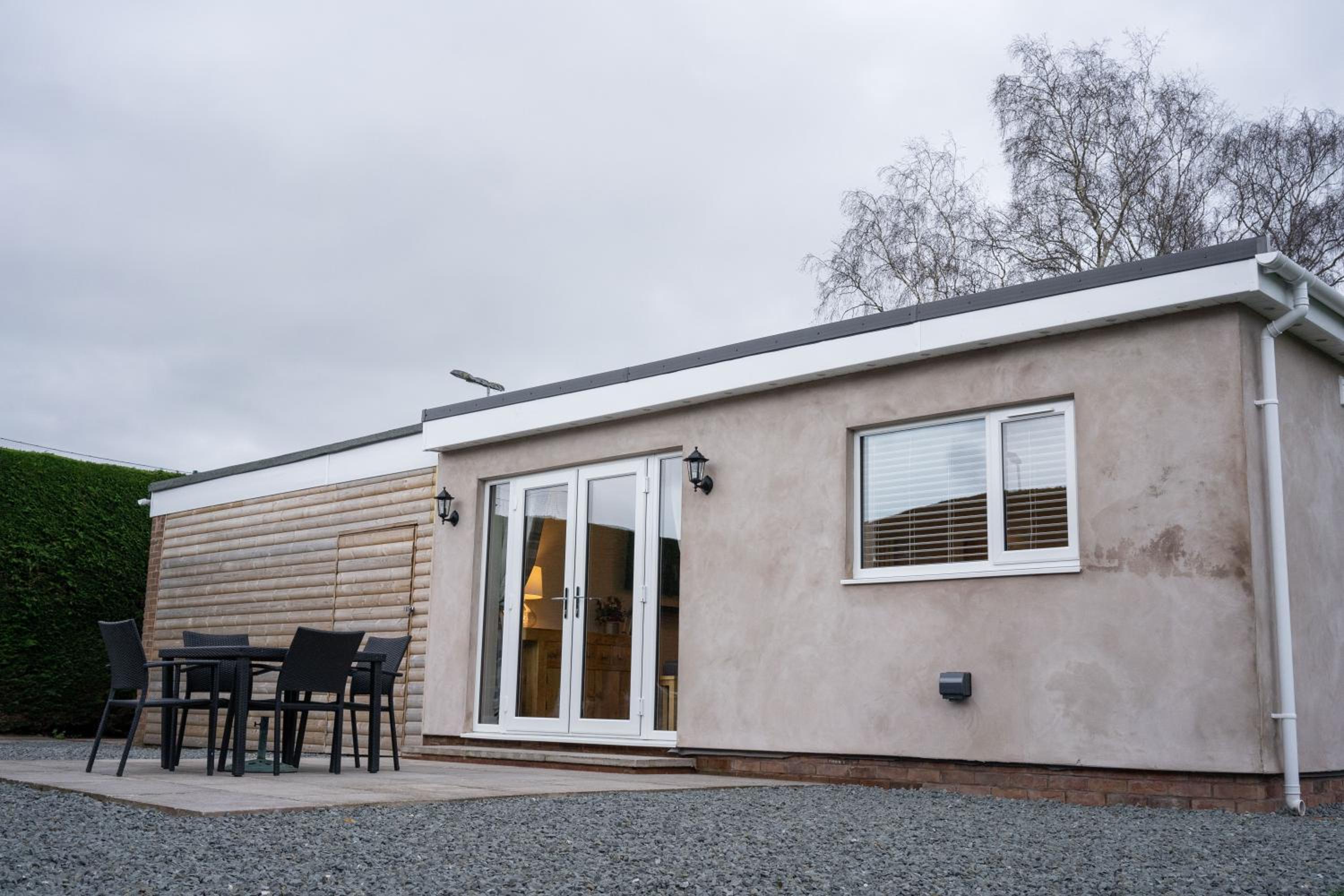 Contemporary new build with parking & garden in central location