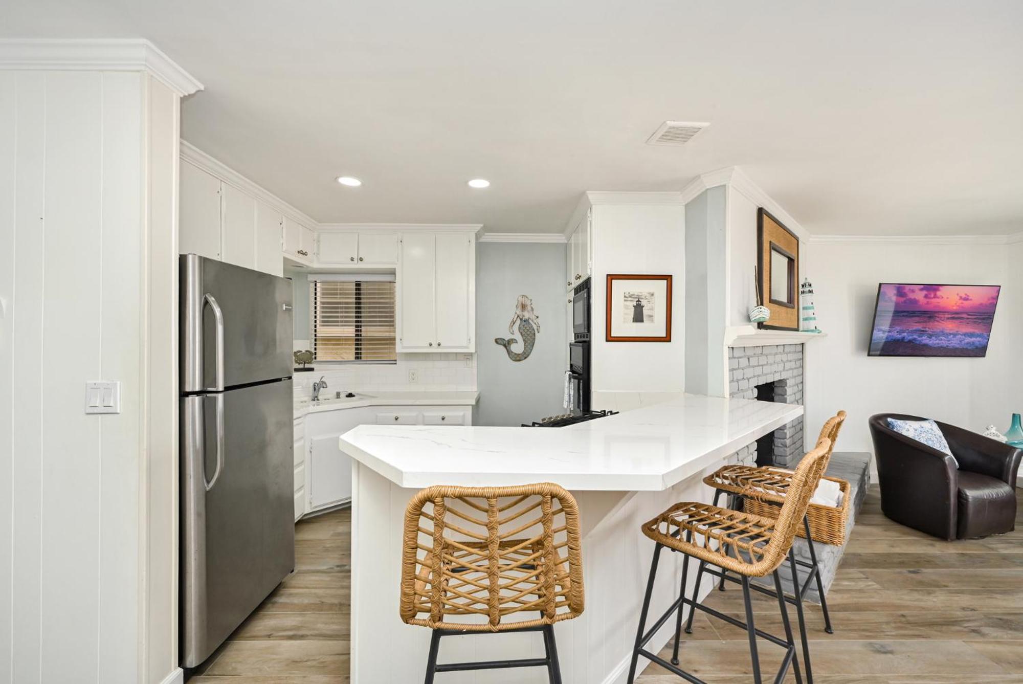 Updated Home on the Boardwalk with Private Rear Unit
