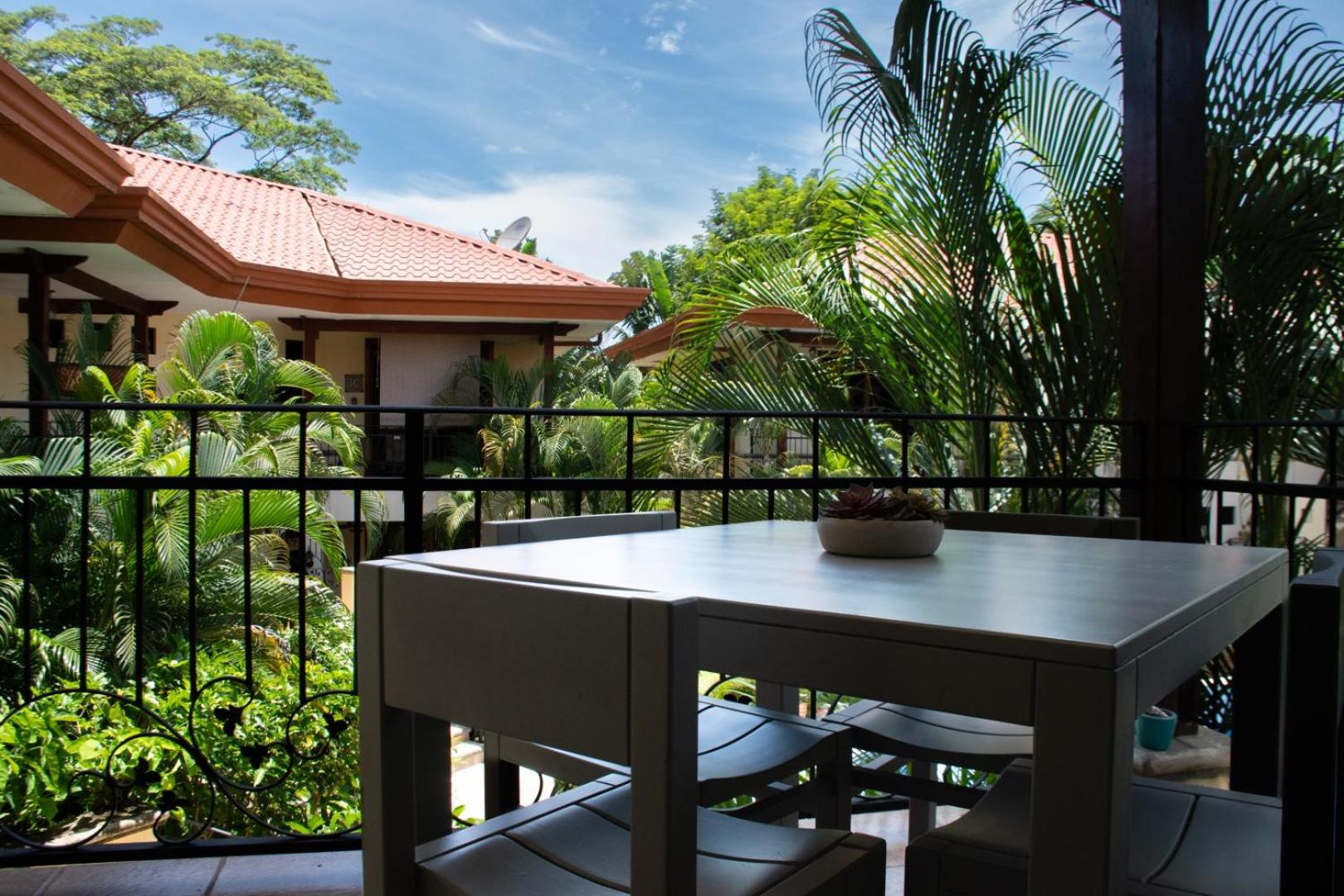 Family Condo Escape 2BR Gated Pool Jacuzzis Security Terrace 2km Walk Beach and Town