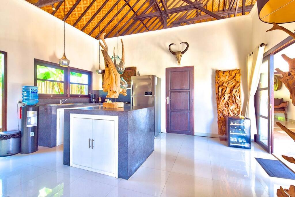 Beautiful Beach Villa Nujum with staff.