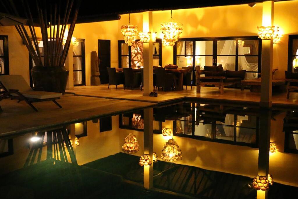 Beautiful Beach Villa Nujum with staff.