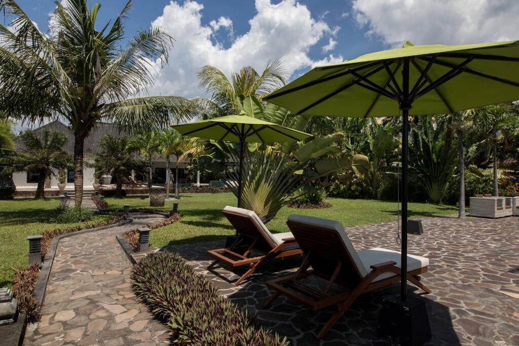 Beautiful Beach Villa Nujum with staff.