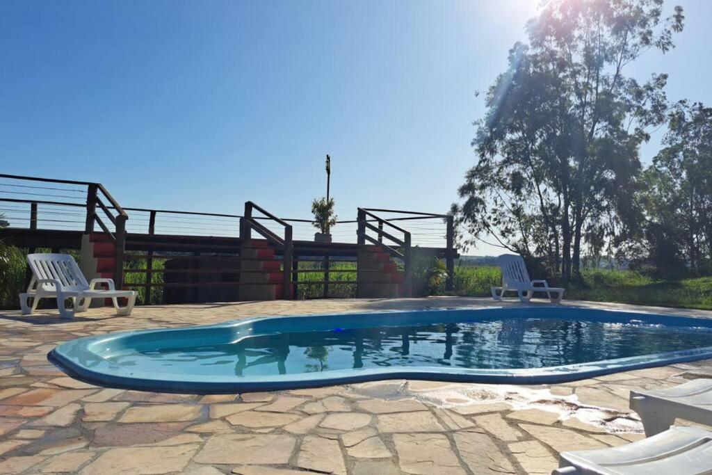 Casa em sítio à beira do Rio Piracicaba c piscina e dois quartos