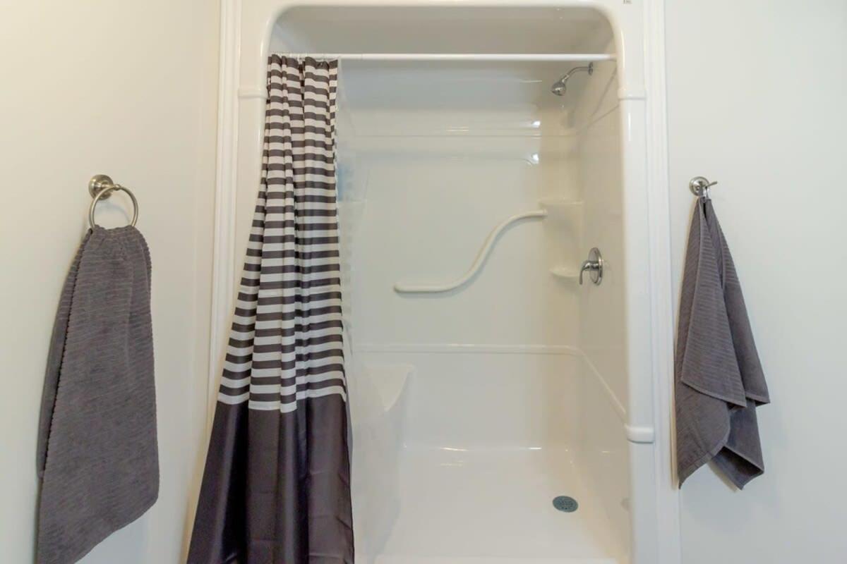 New 2BD Condo, UNB, Hospital, Golf, Patio Coffee