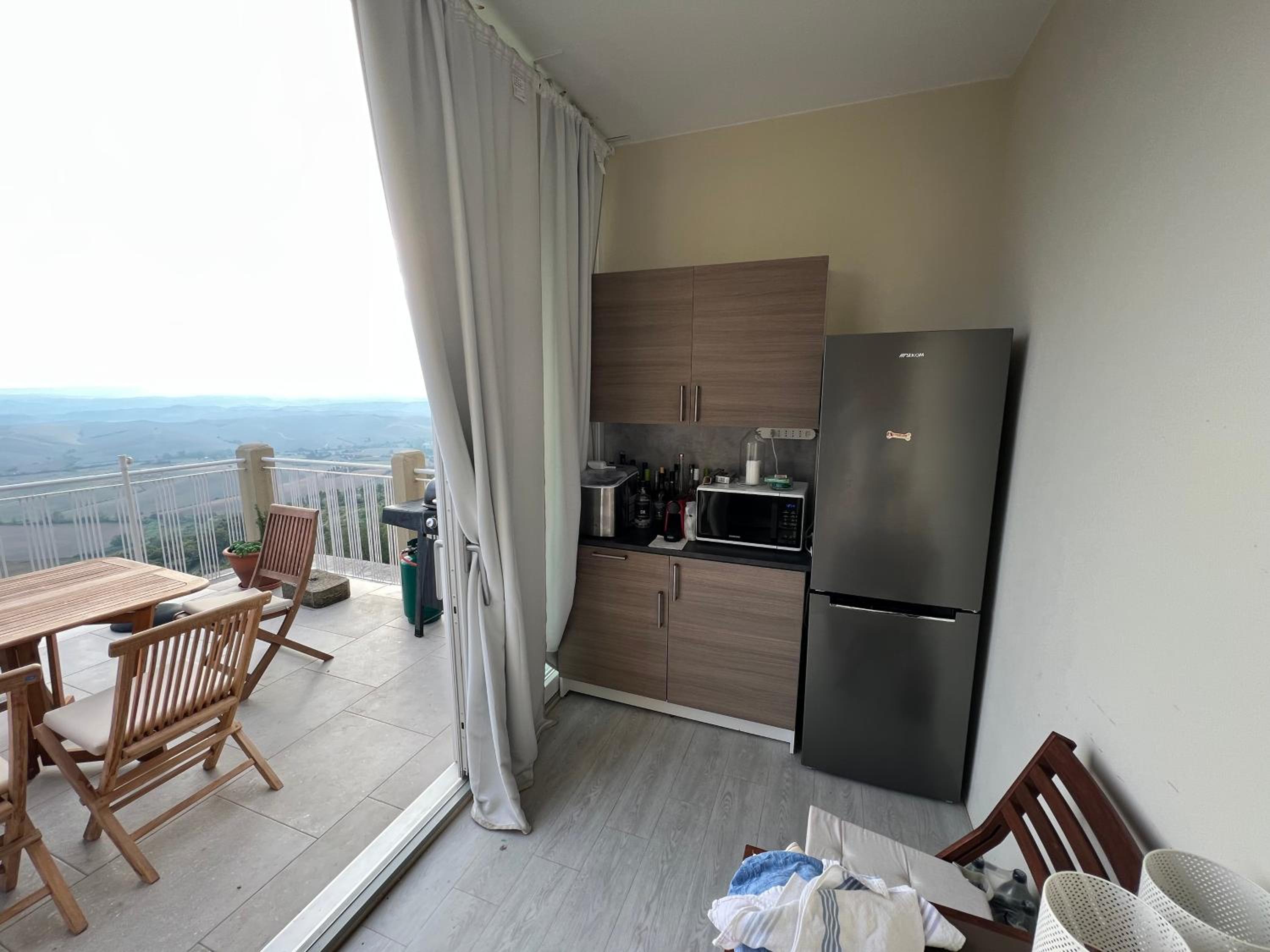 PANORAMA TERAZZA CON JACUZZI en Rivalto — kitchen
