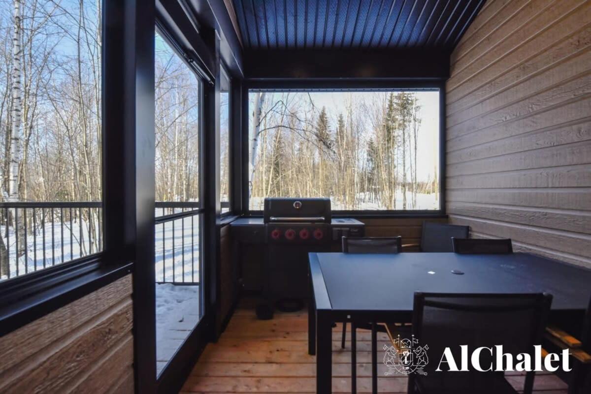 Achille - Boisé avec spa et sauna