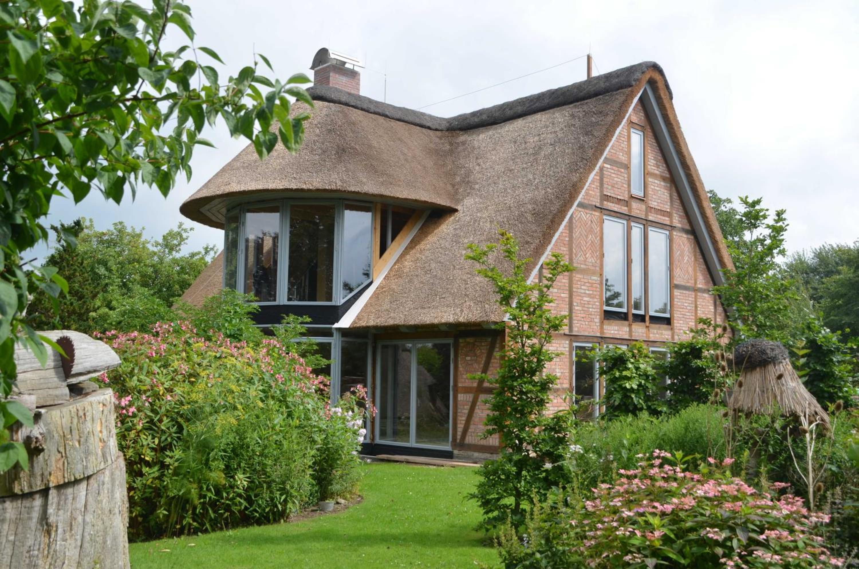 Reetgedecktes Espenhaus