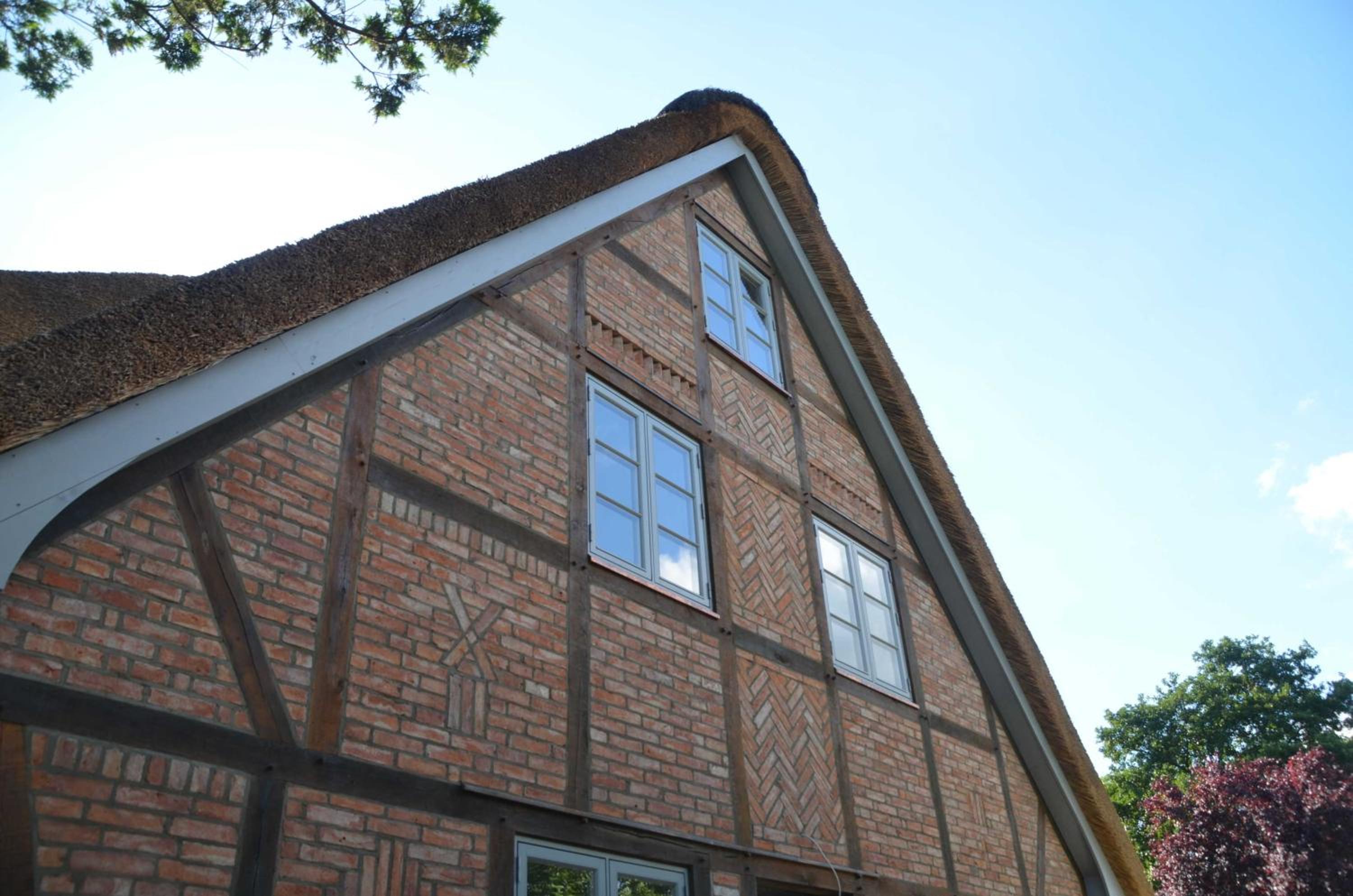 Reetgedecktes Espenhaus