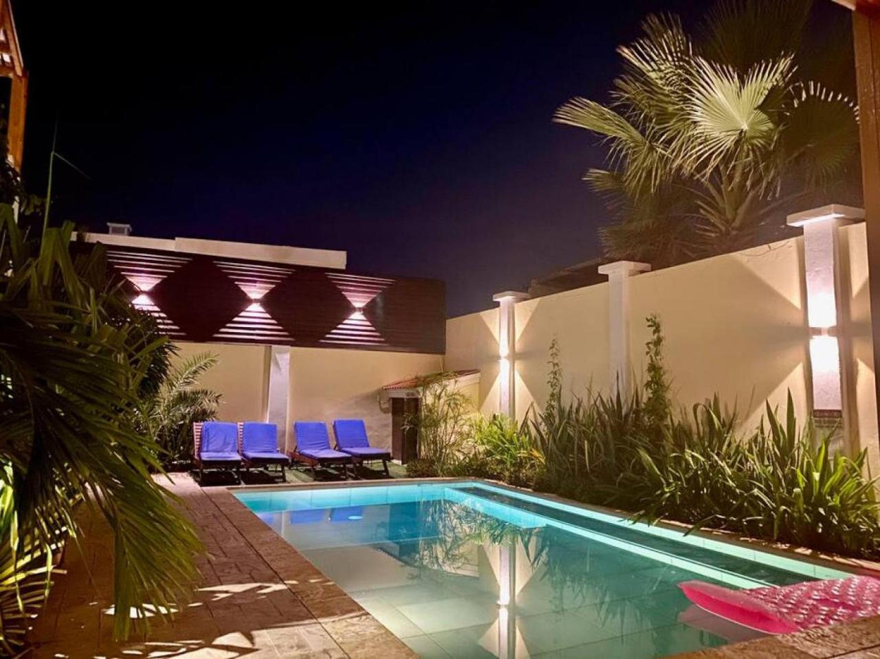 Villa and Pool walk to Palm Beach ideal for GROUPS