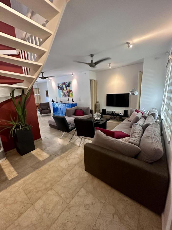 Villa and Pool walk to Palm Beach ideal for GROUPS