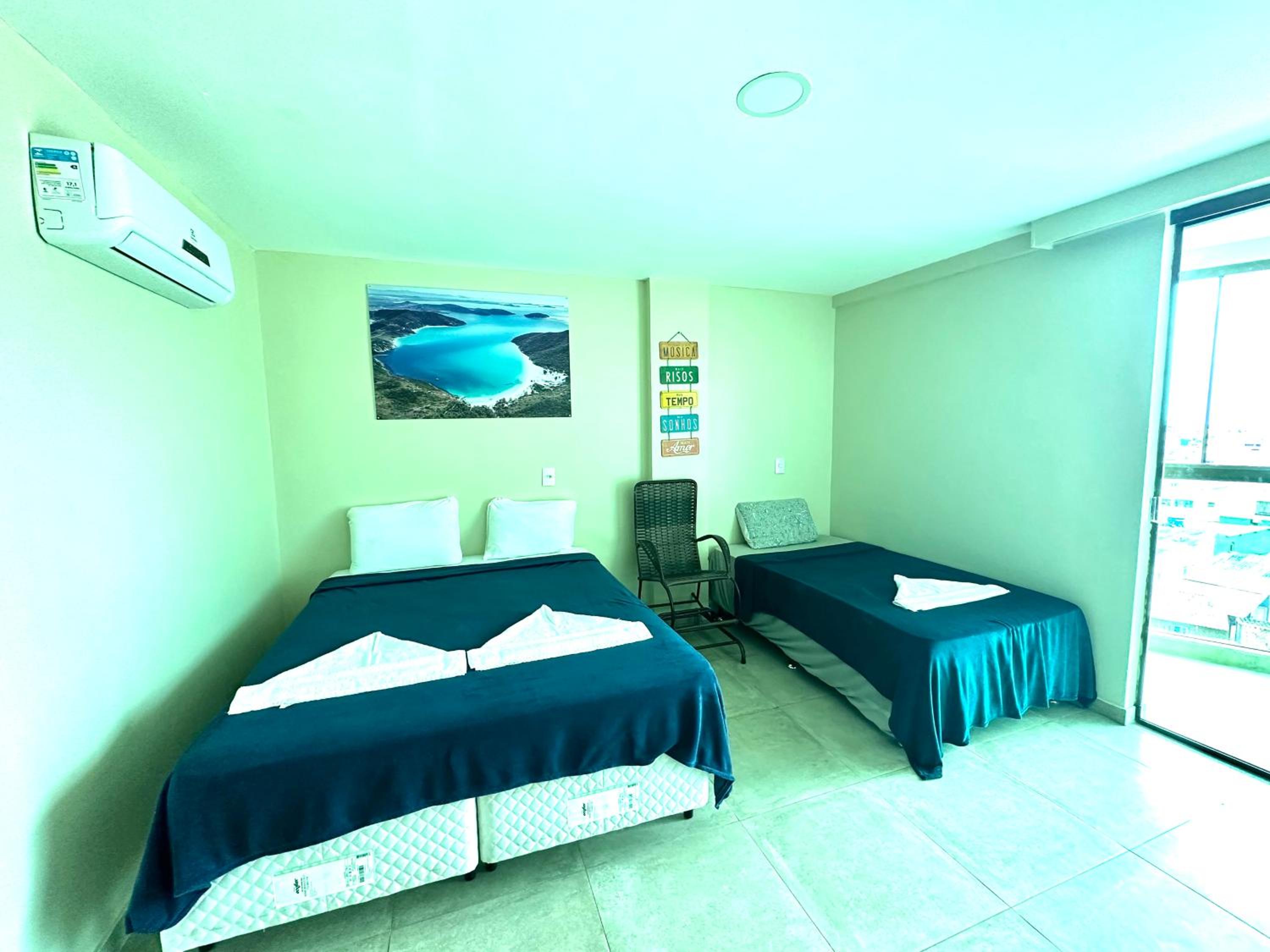Apartamento com 2 quartos até 7 Pessoas- Orla da Praia Grande
