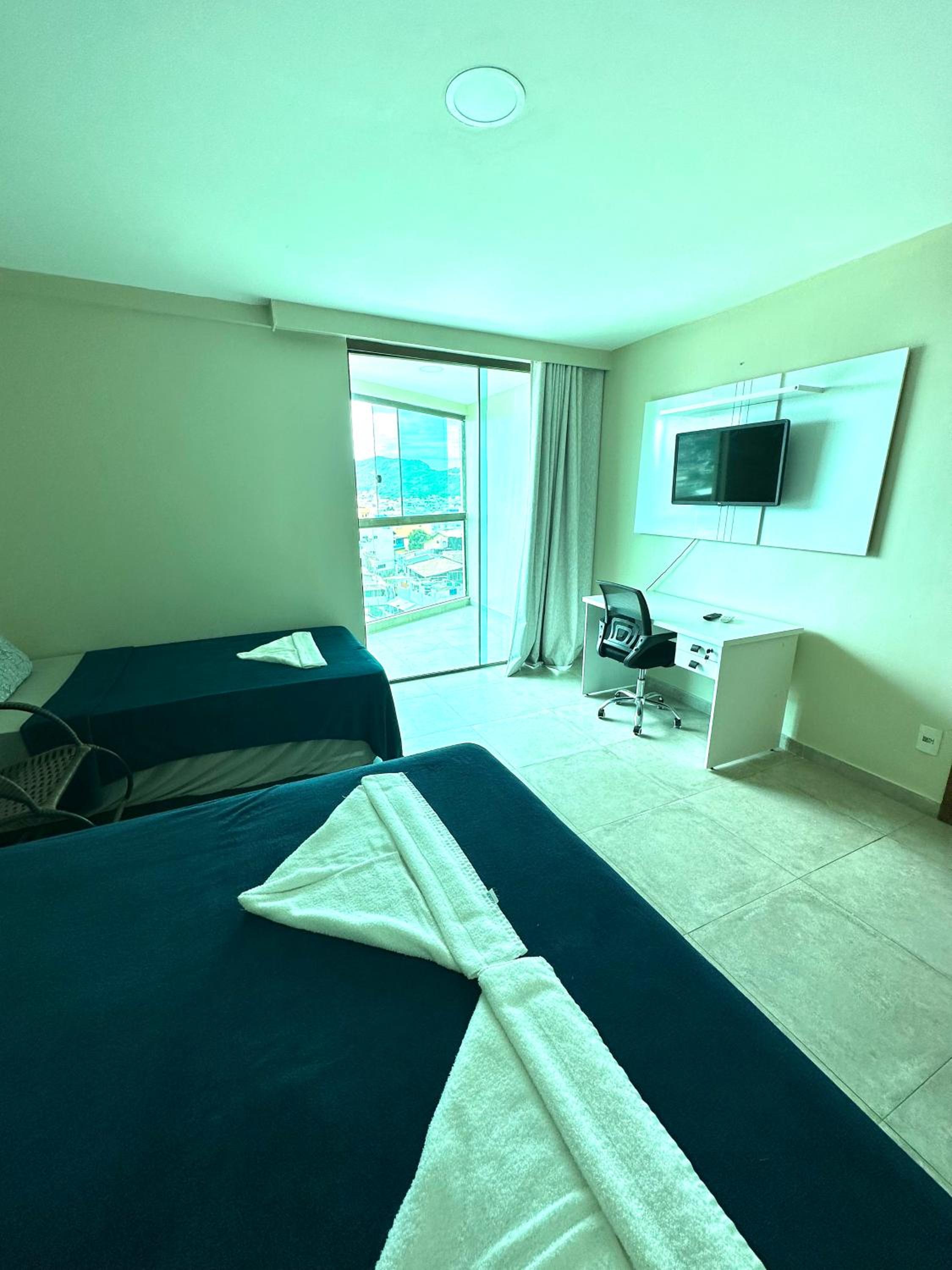 Apartamento com 2 quartos até 7 Pessoas- Orla da Praia Grande