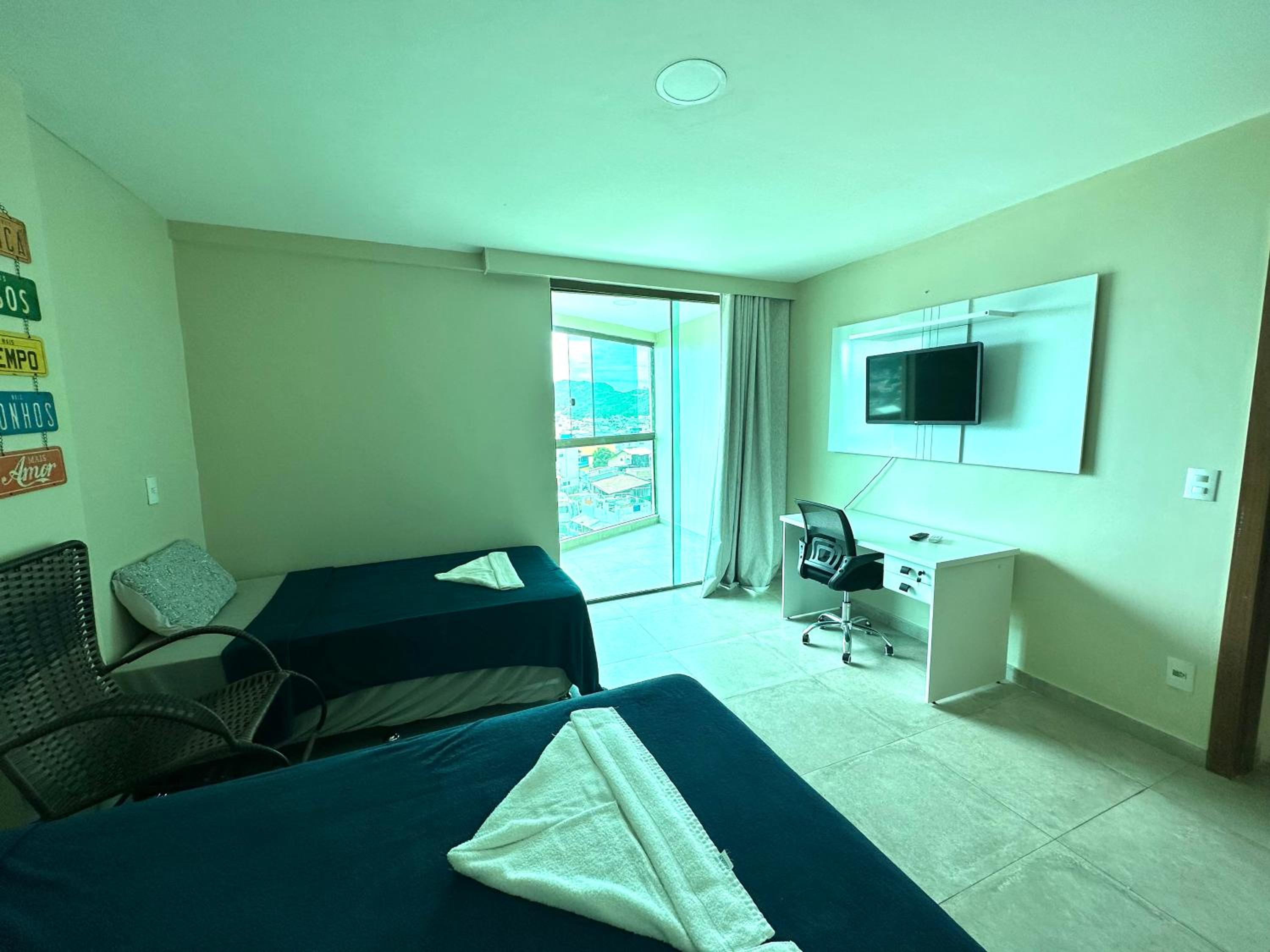 Apartamento com 2 quartos até 7 Pessoas- Orla da Praia Grande