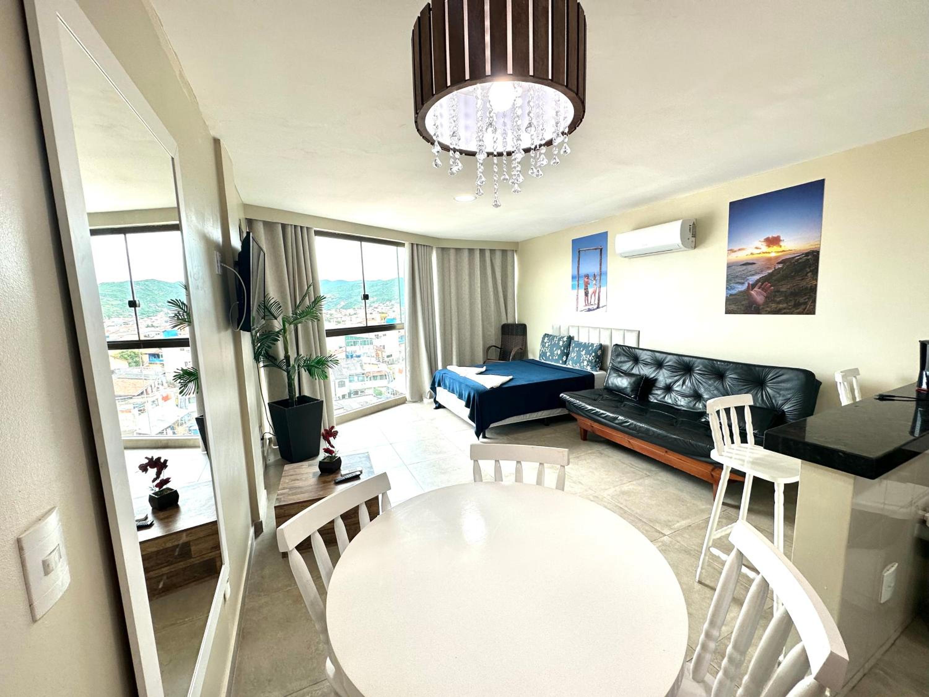 Apartamento com 2 quartos até 7 Pessoas- Orla da Praia Grande