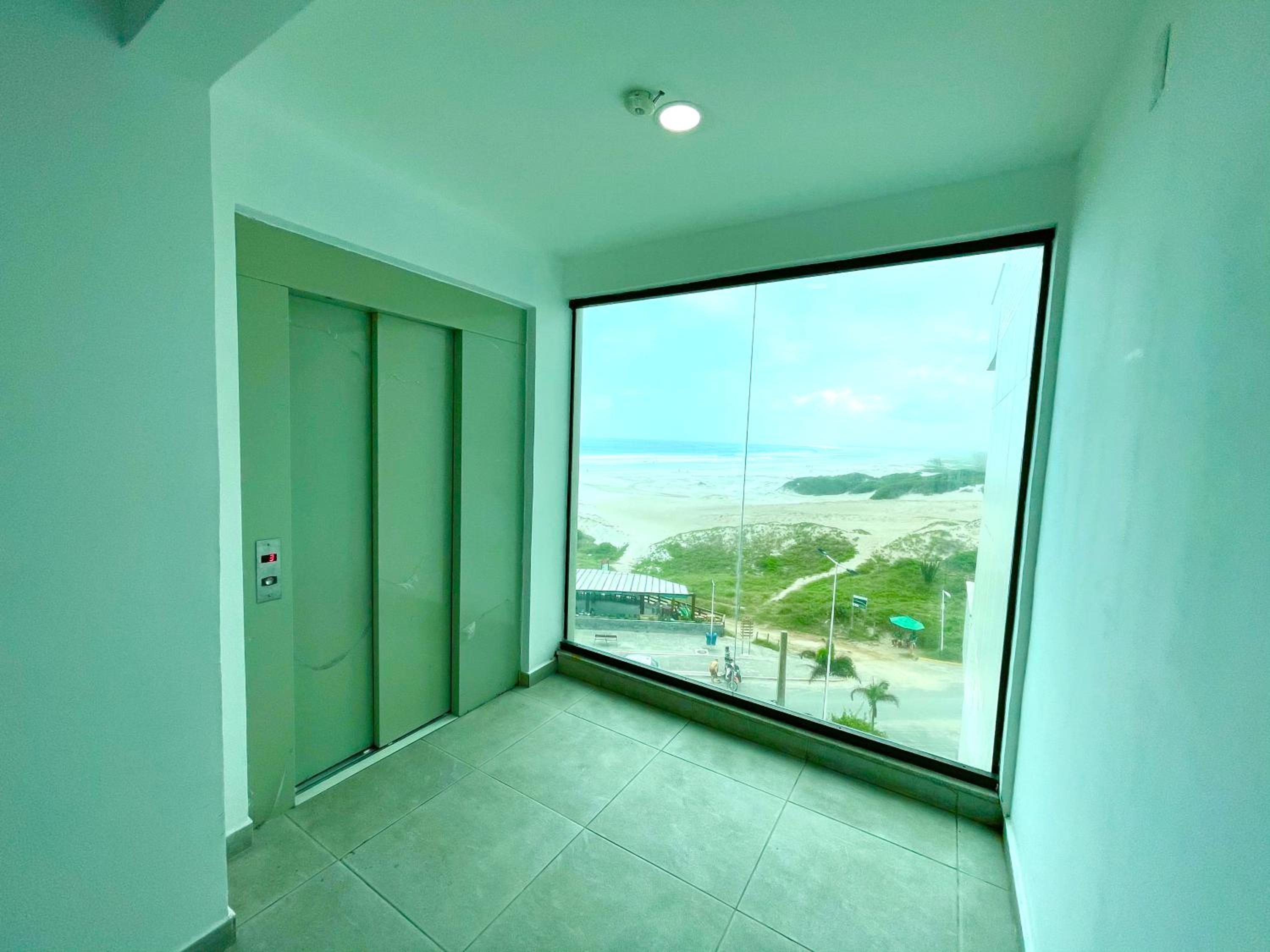 Apartamento com 2 quartos até 7 Pessoas- Orla da Praia Grande