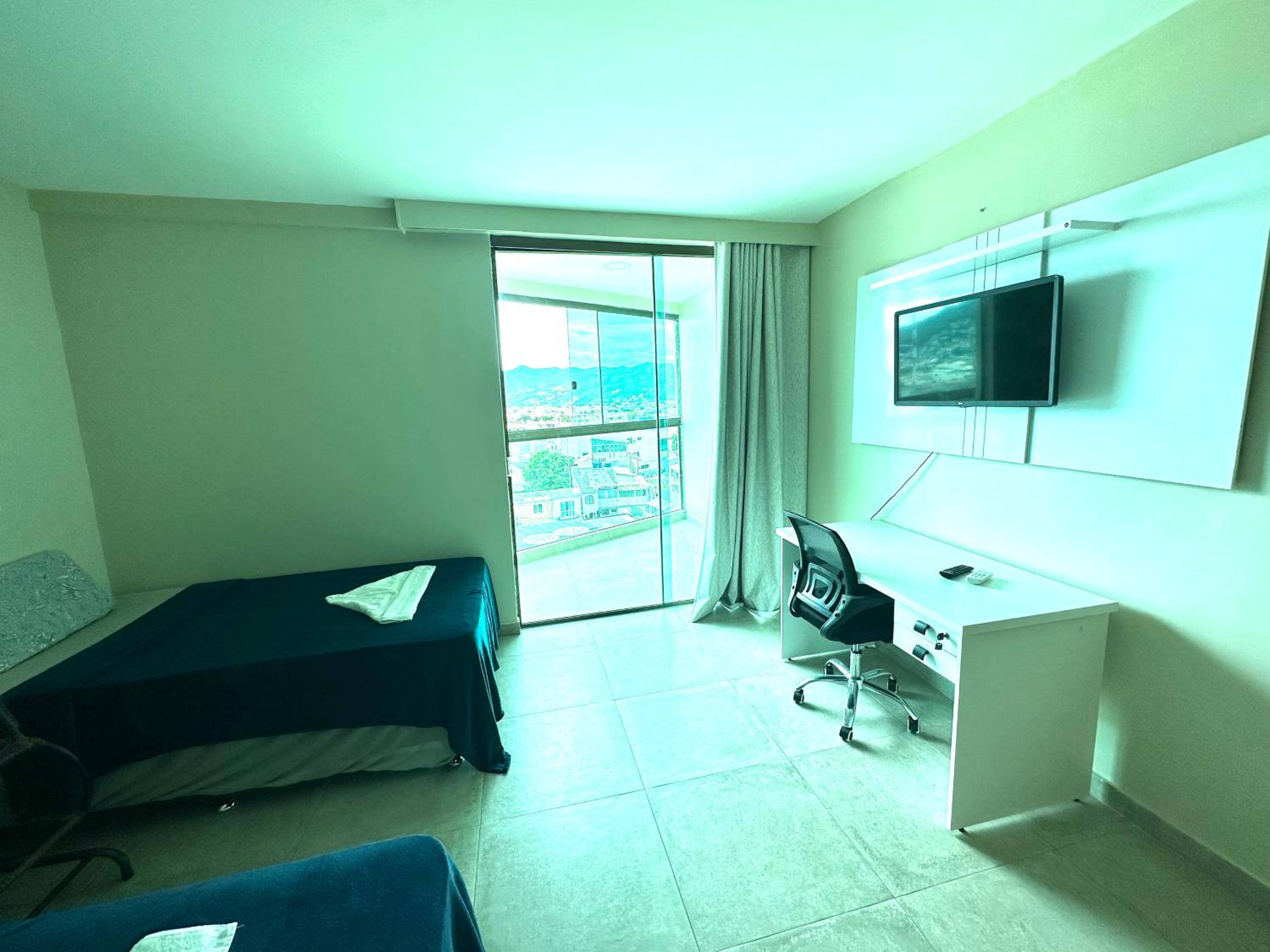 Apartamento com 2 quartos até 7 Pessoas- Orla da Praia Grande