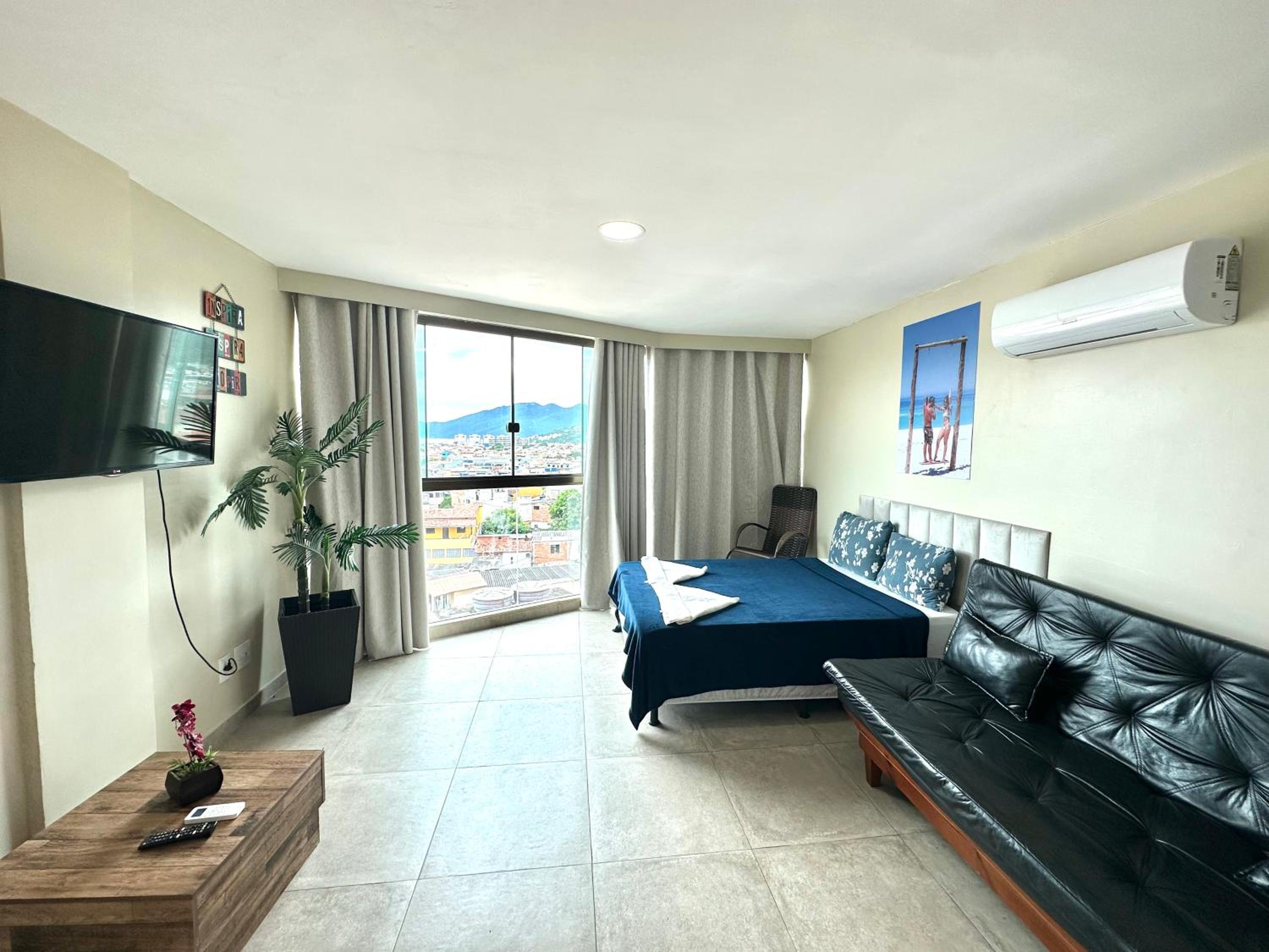 Apartamento com 2 quartos até 7 Pessoas- Orla da Praia Grande
