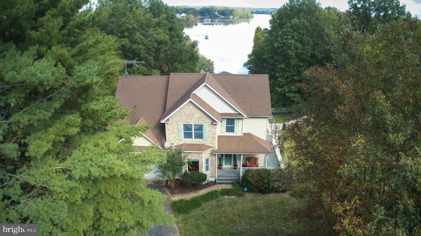 Secluded 3 Acre 5 BR Resort with Heated Private Lakeview Saltwater Infinity Pool, Hot Tub, Boat House, Sauna, and Game Room view 2