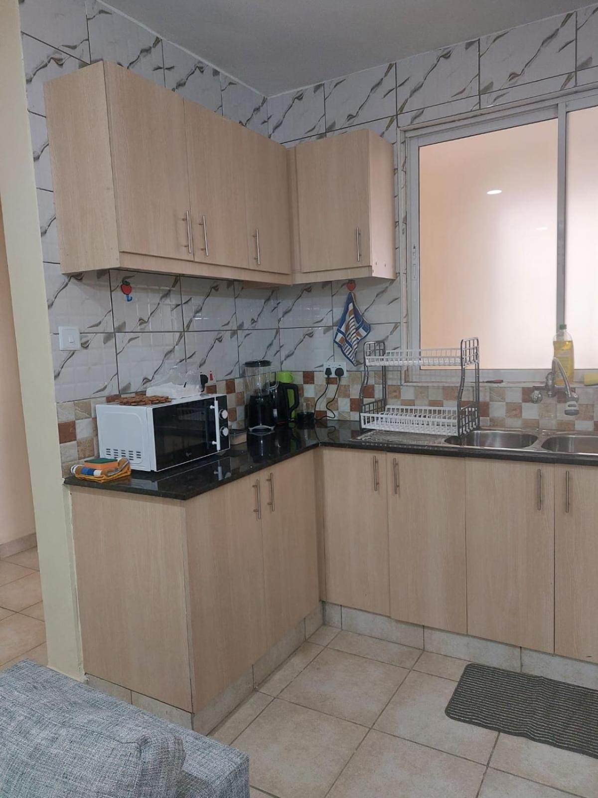 Roma Stays - Elegant 1bedroom Apartment near PrideInn Flamingo view 4