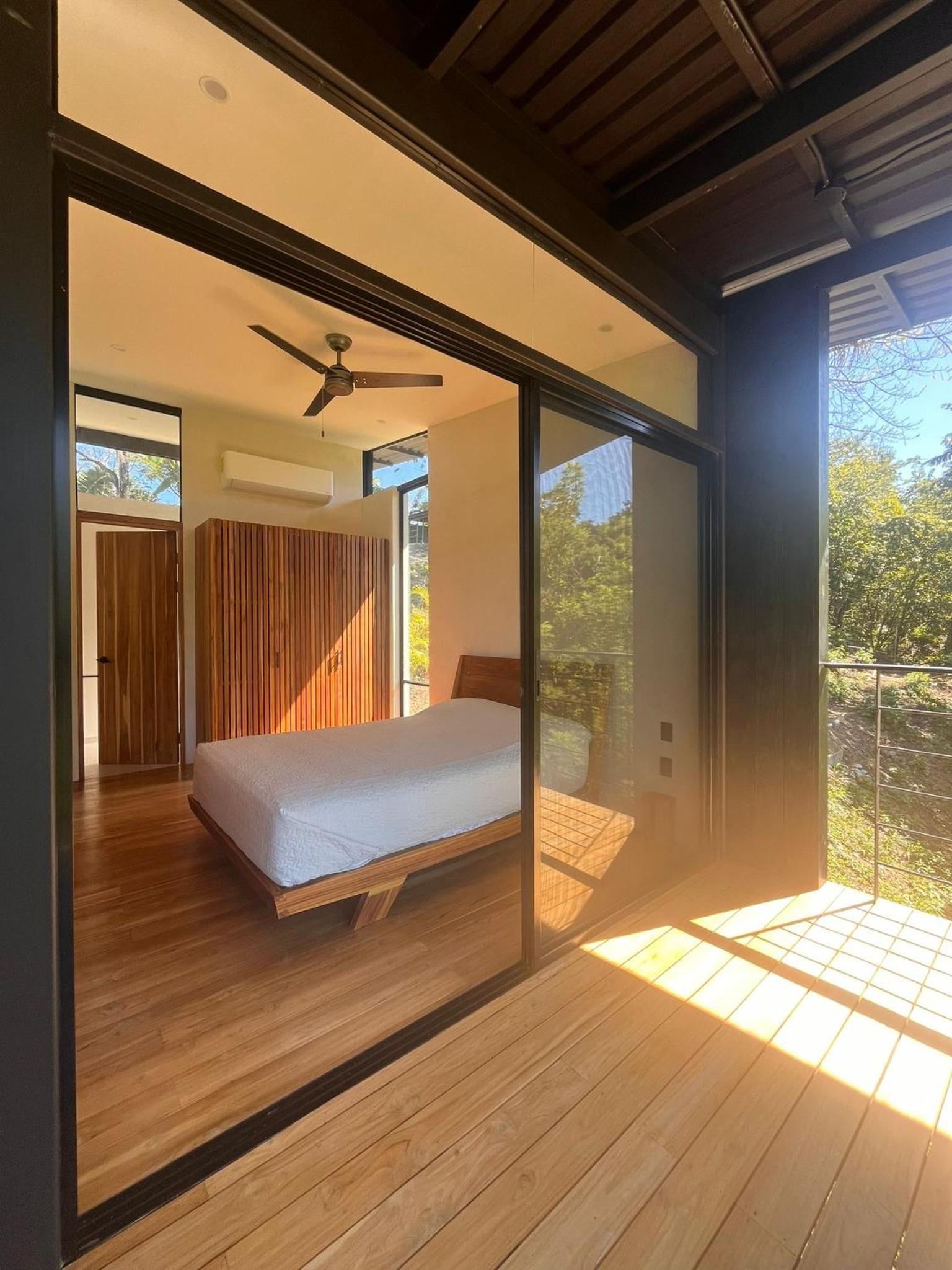 Modern House with Jungle Sunset View