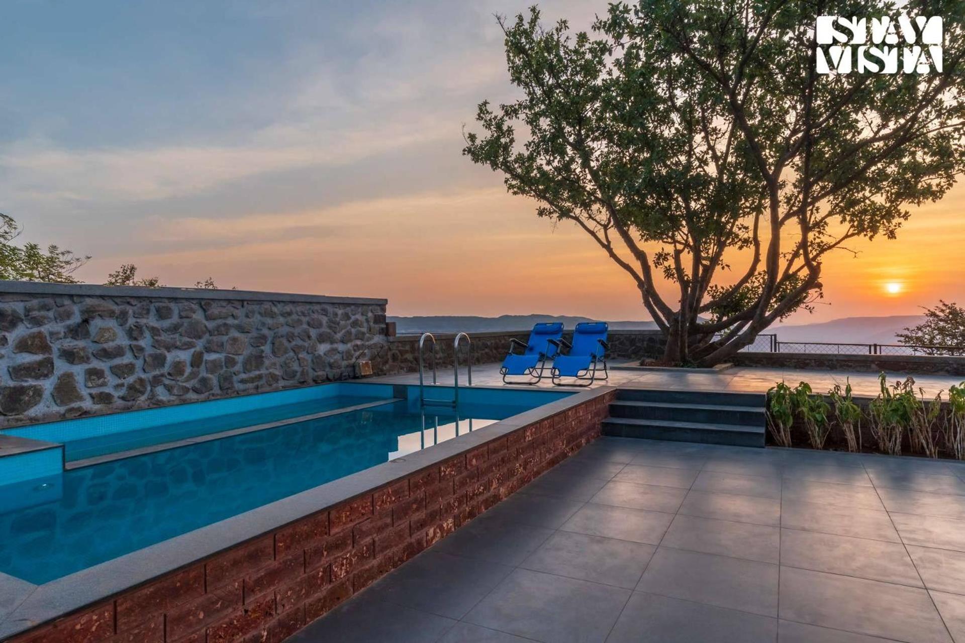 Dawn Ecstasy by StayVista - Hill-view villa with Modern interiors, Garden area & Indoor games view 3