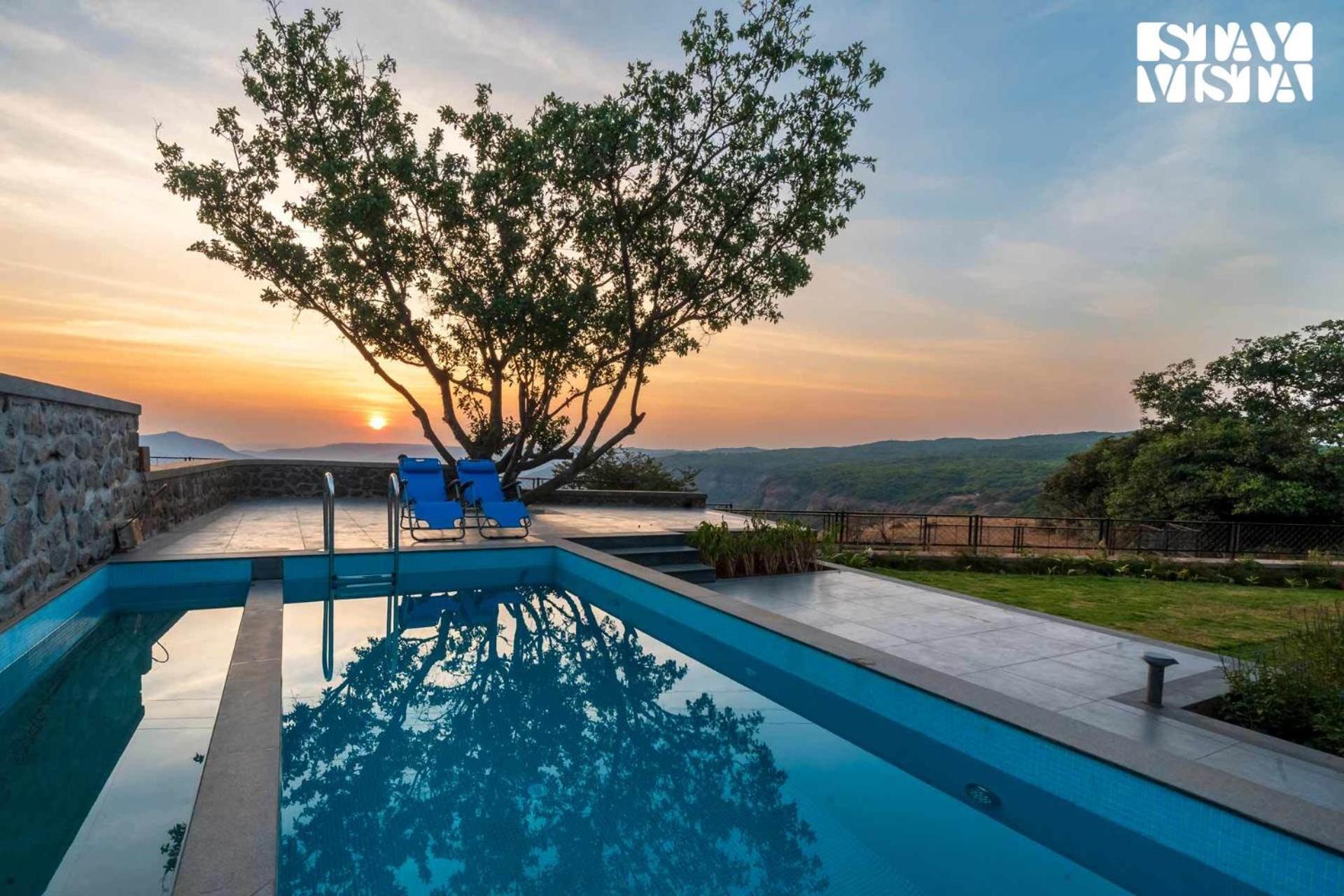 Dawn Ecstasy by StayVista - Hill-view villa with Modern interiors, Garden area & Indoor games view 2
