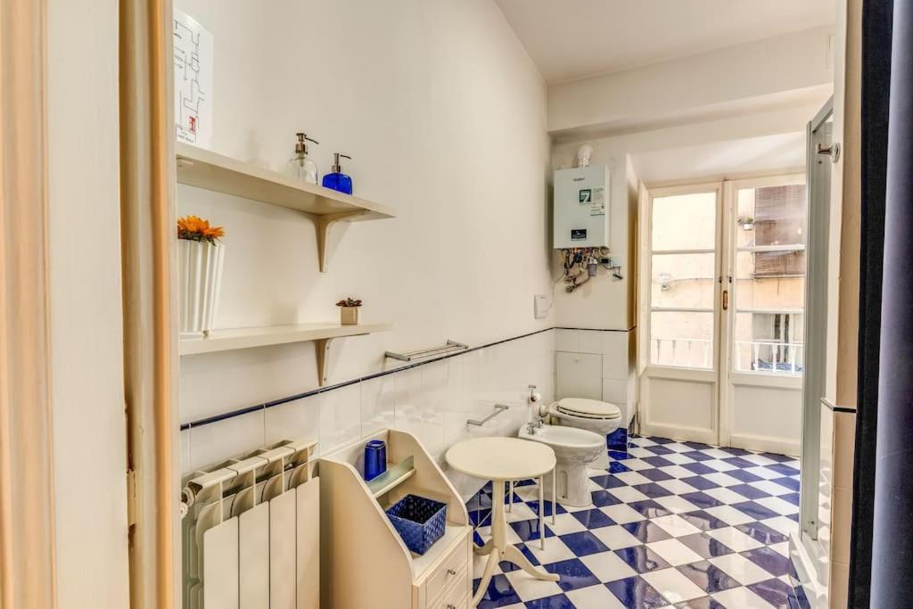 XX SETT: Flat by Barberini Trevi Fountain