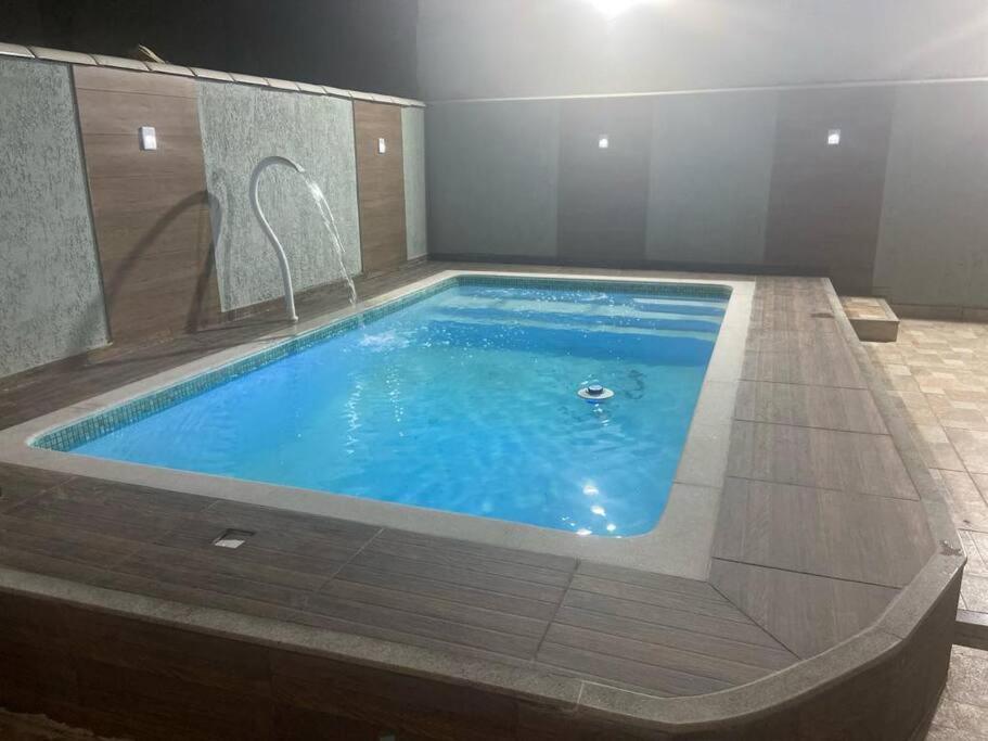 Casa com piscina, grande e espaçosa no Condomínio dos Pássaros