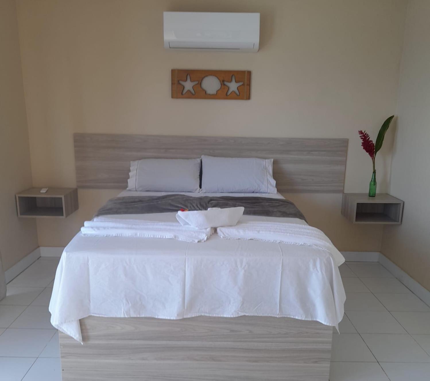 Casa Laranja em Condomínio Pé na Areia