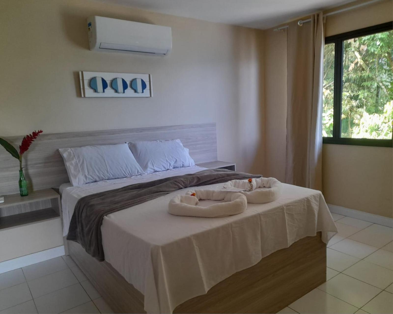 Casa Laranja em Condomínio Pé na Areia