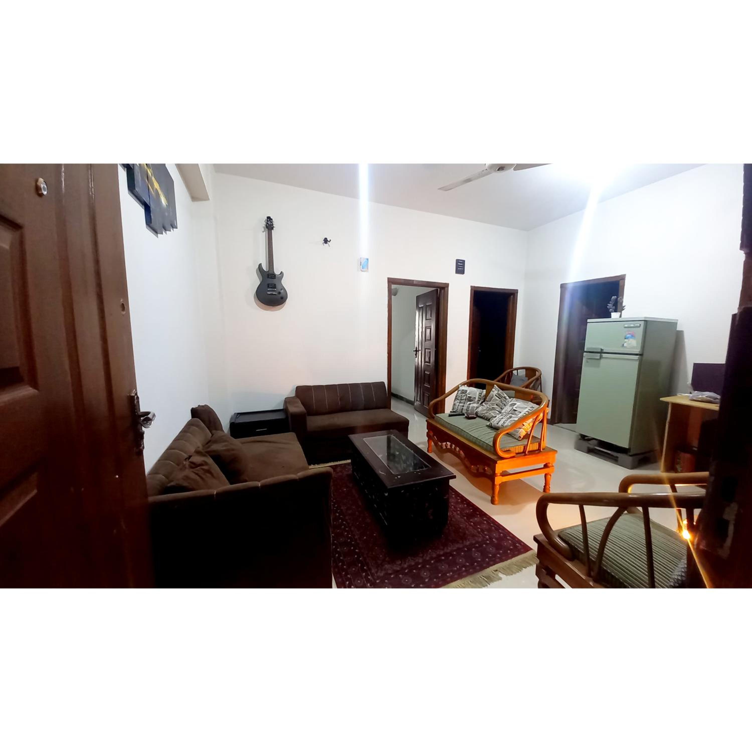Central City Holiday 2BHK E11 family view 5