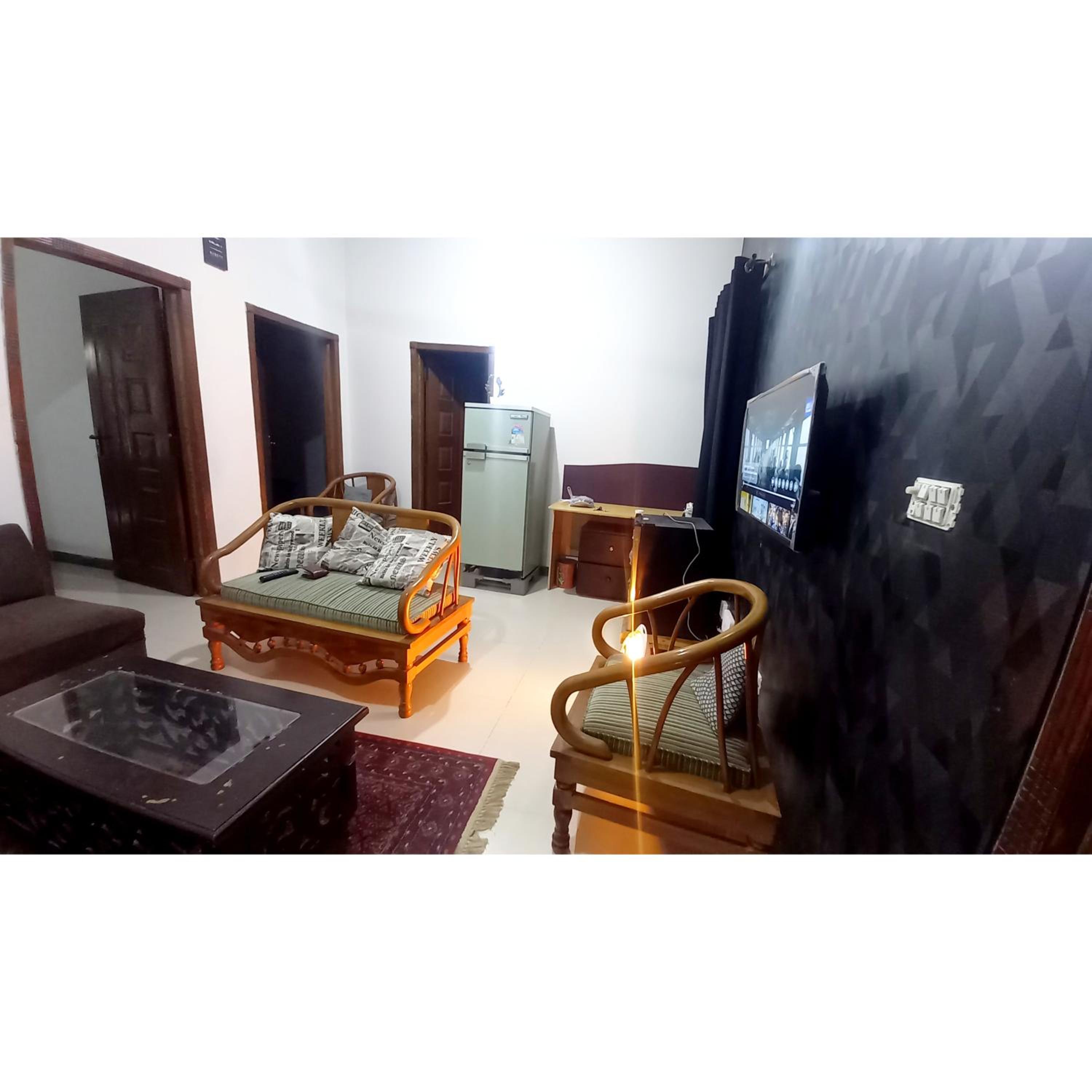 Central City Holiday 2BHK E11 family view 4