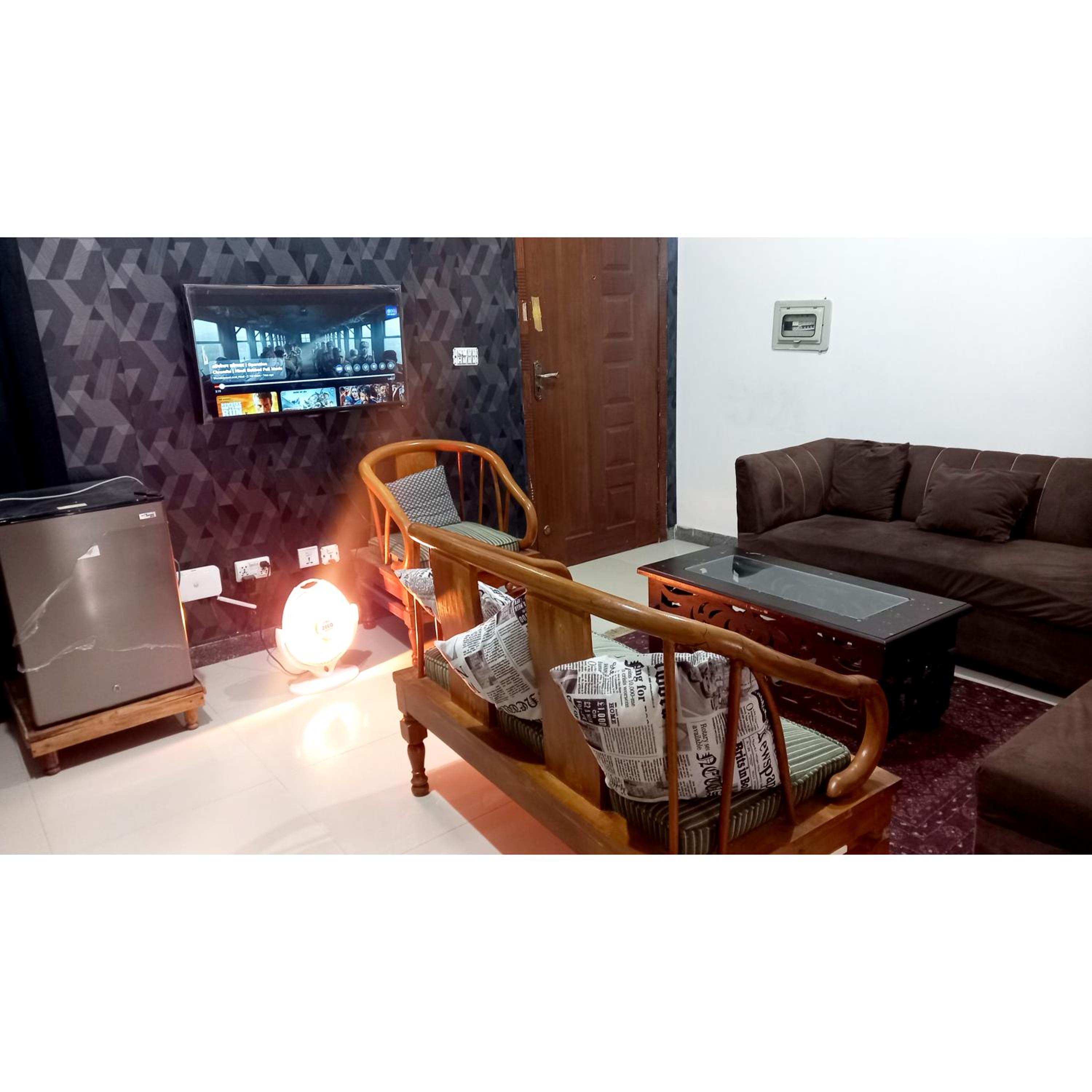 Central City Holiday 2BHK E11 family view 3