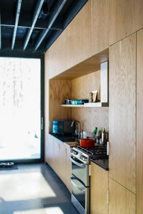 Glass cabin in the woods.