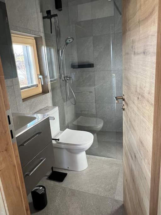 Exklusives Seehaus LAKEHOUSE in Bestlage mit privaten Sandstrand und eigenem Boot und SUP
