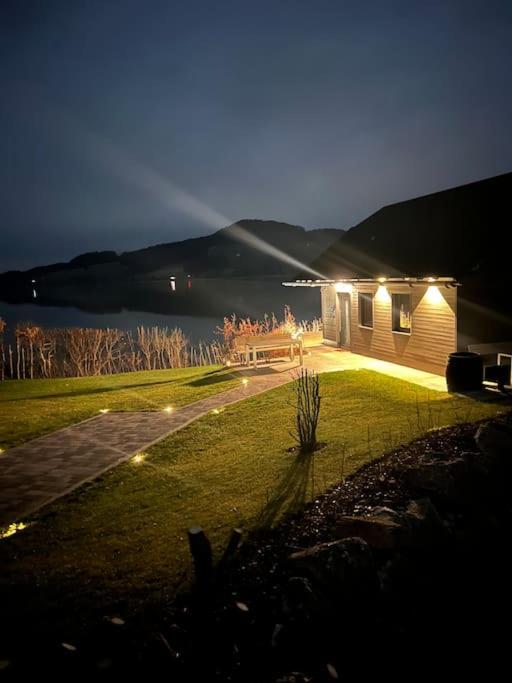 Exklusives Seehaus LAKEHOUSE in Bestlage mit privaten Sandstrand und eigenem Boot und SUP