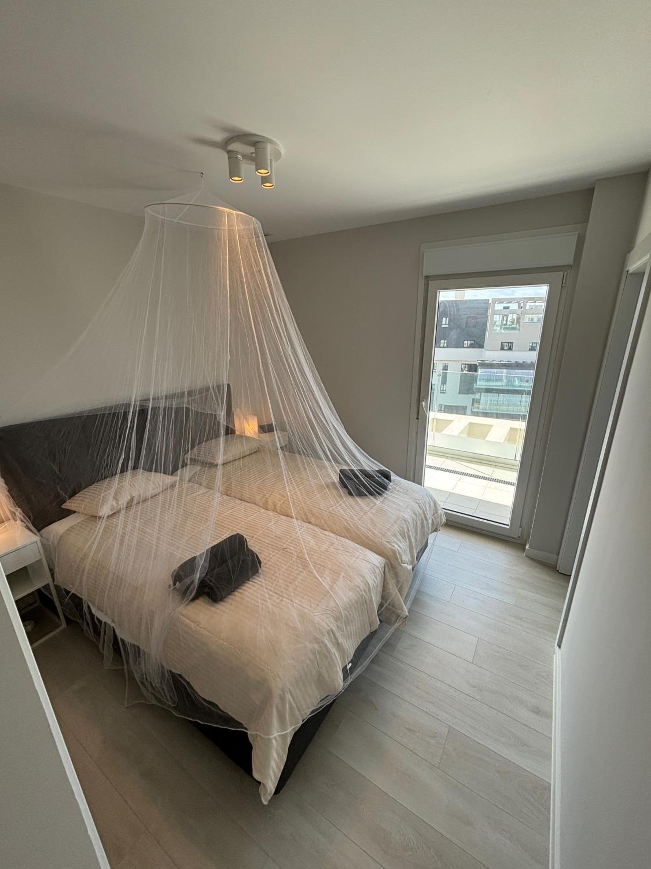 New penthouse with sunny beach view